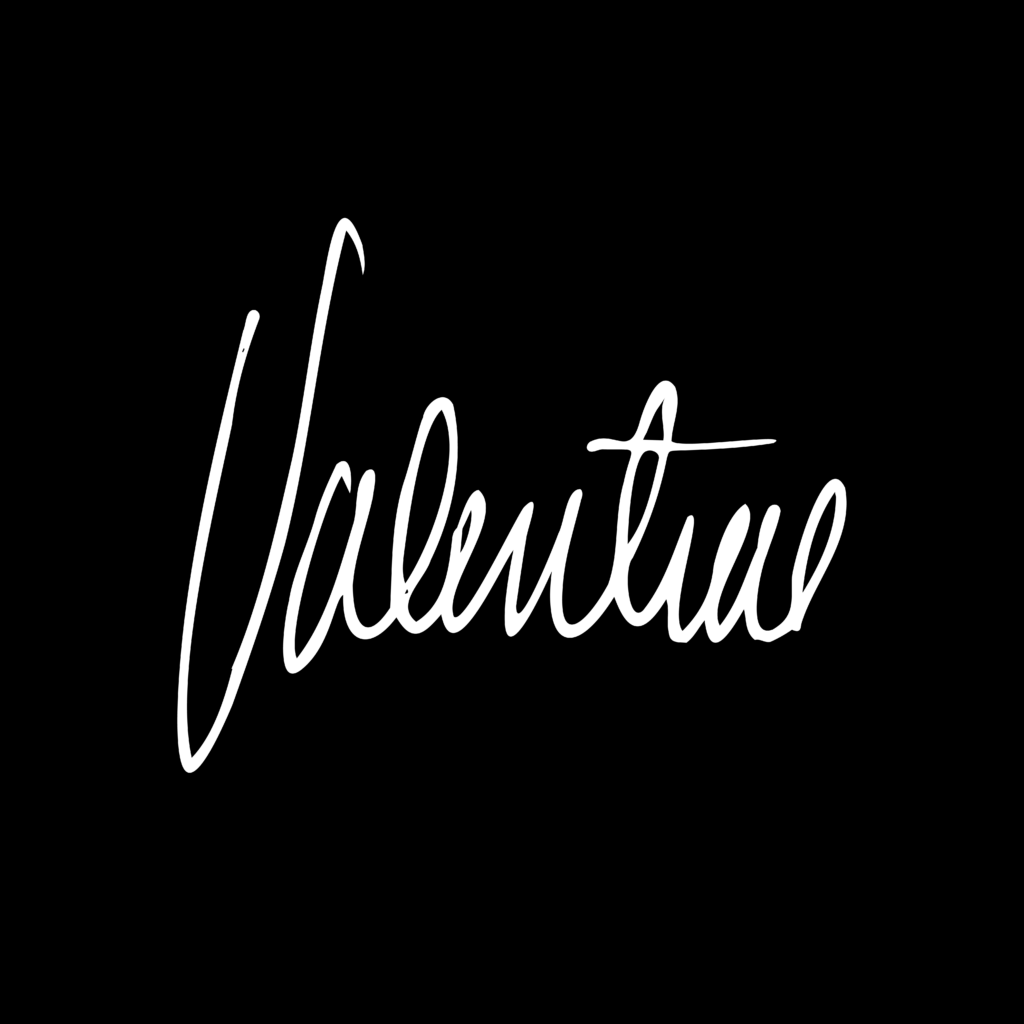 A white signature on a black background that reads "Valentine"